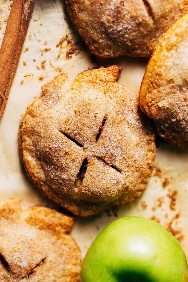 close up on an apple hand pie shaped like an apple