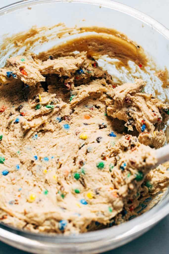 a bowl of m&m cookie dough