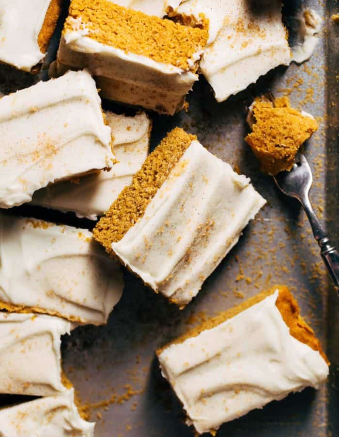 pumpkin bars scattered on a baking tray