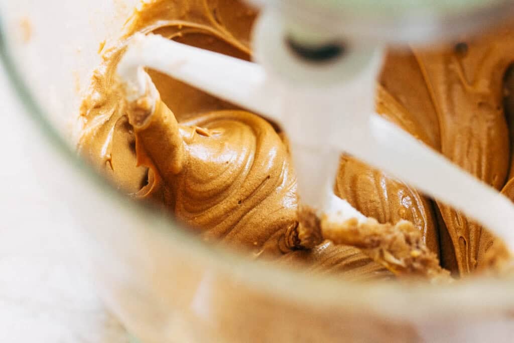 a bowl of gingerbread cookie dough wet ingredients