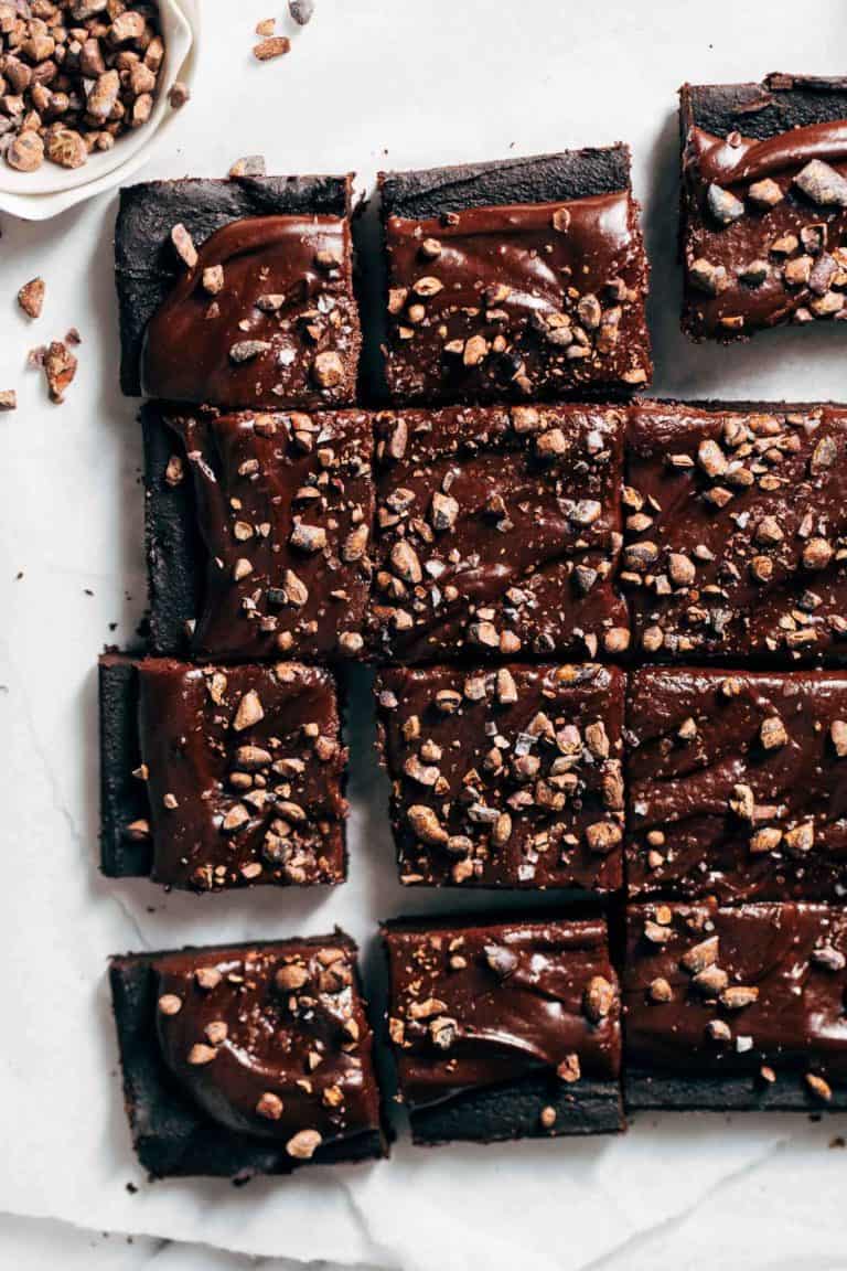 sliced chickpea brownies topped with chocolate ganache