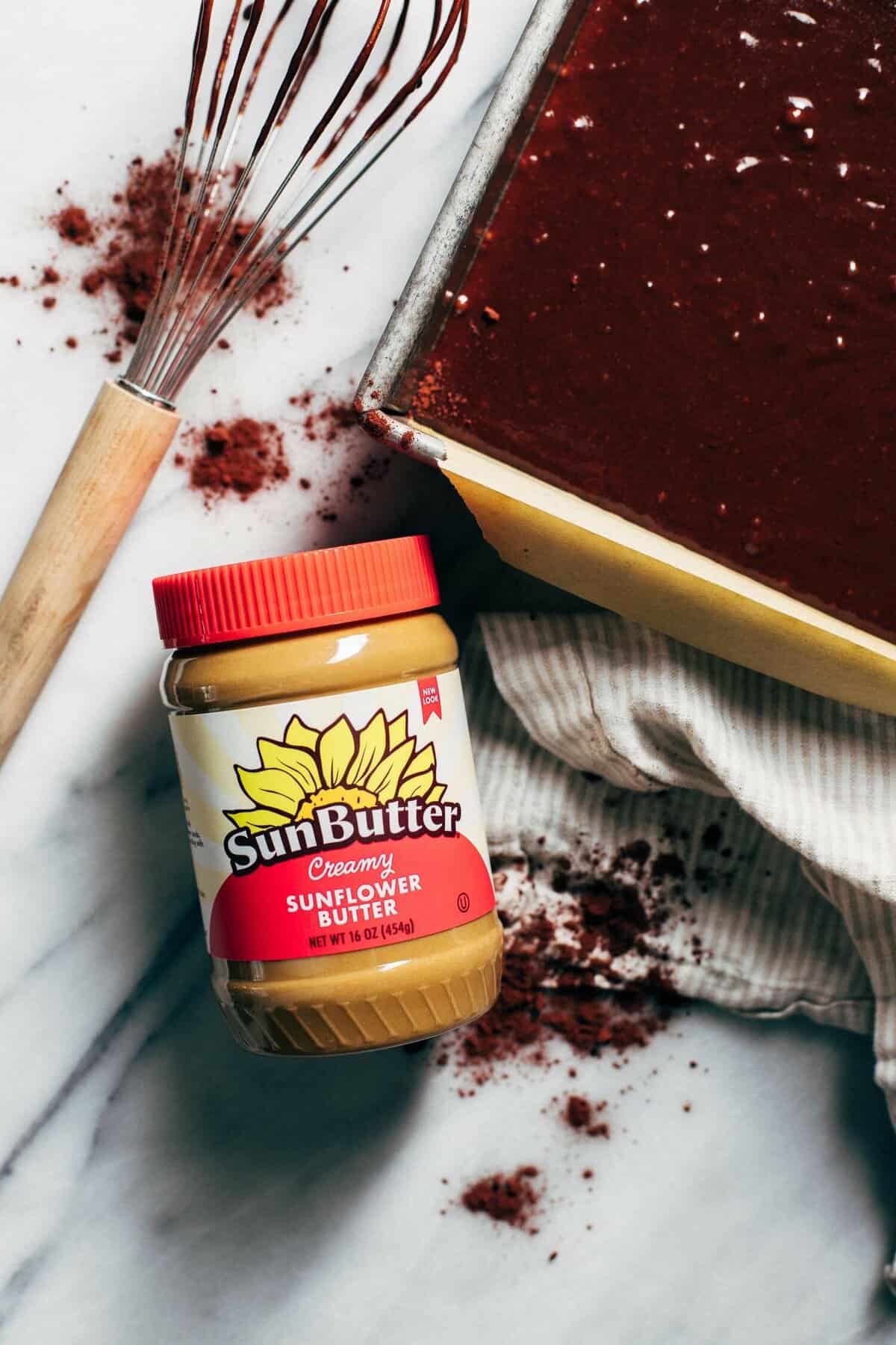 a jar of SunButter with chocolate cake batter