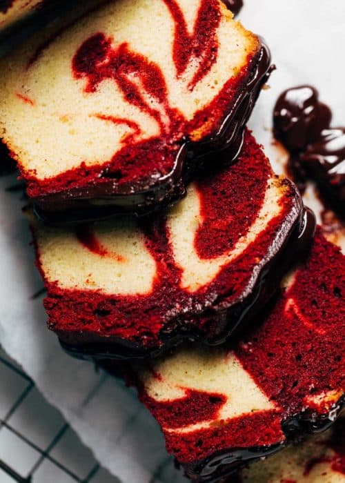 close up on slices of red velvet swirled pound cake
