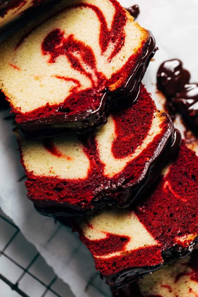 close up on slices of red velvet swirled pound cake