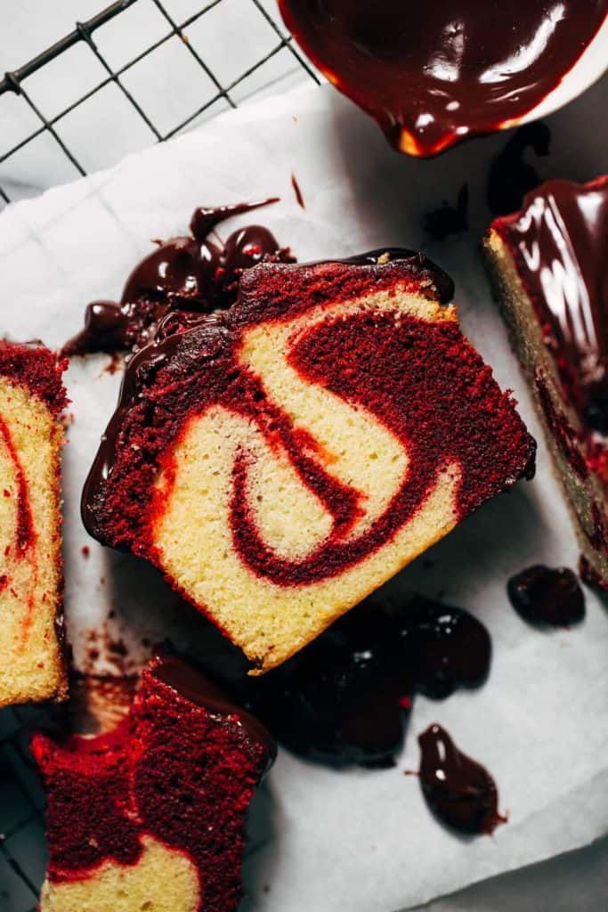 close up on a slice of red velvet swirled pound cake