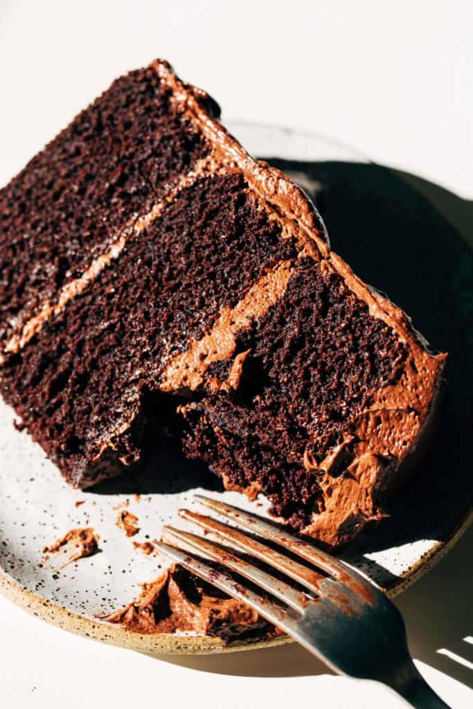 close up on a slice of gluten free chocolate cake
