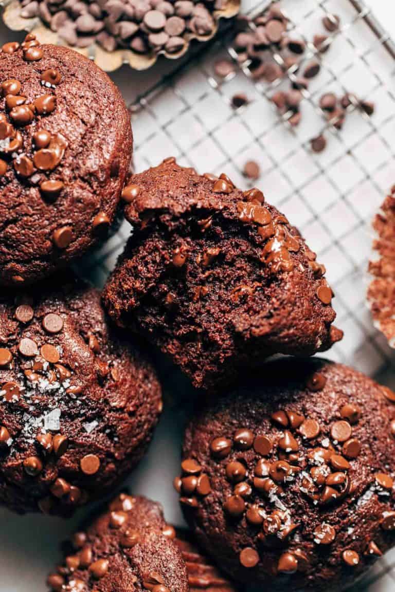 close up on a chocolate muffin with a bite taken out