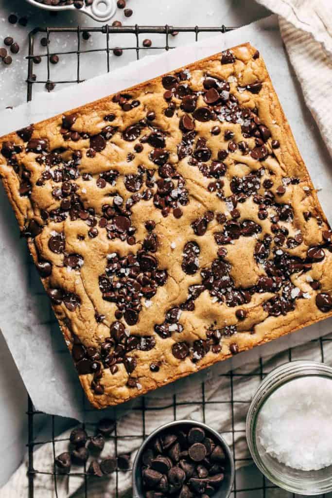 freshly baked chocolate chip cookie bars before sliced