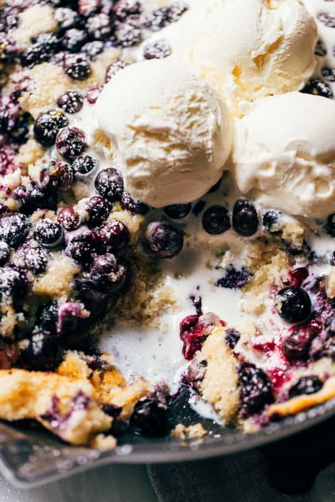 spoonfuls taken from a blueberry cobbler