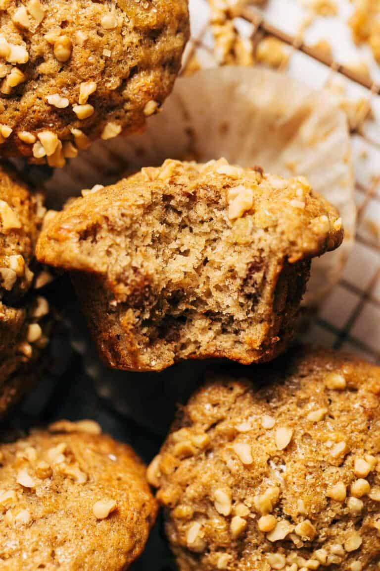 close up on a bite taken from a banana nut muffin