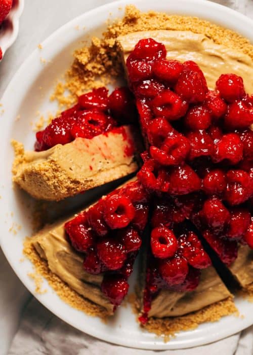 the top of a sliced sunbutter and raspberry pie