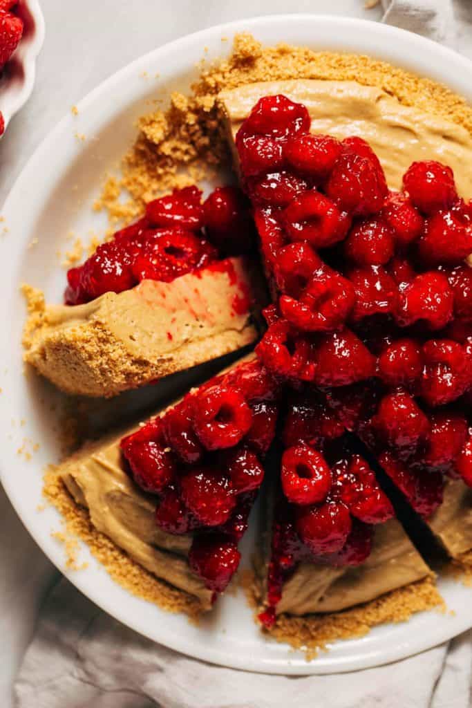 the top of a sliced sunbutter and raspberry pie