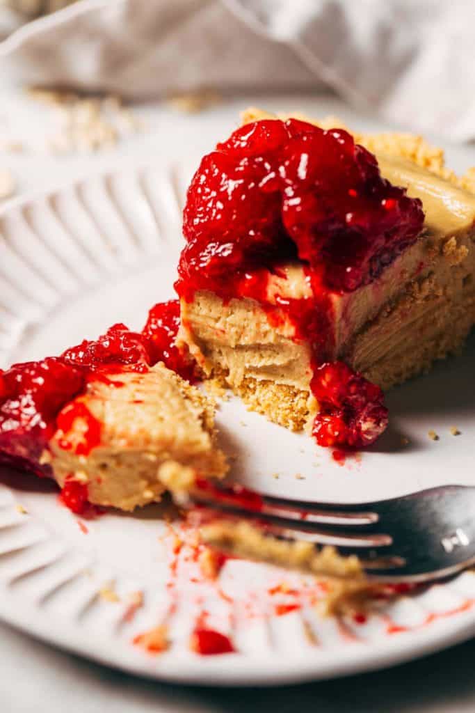 close up on a slice of sunbutter raspberry pie