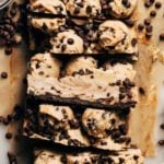the side of a slice of cookie dough cheesecake