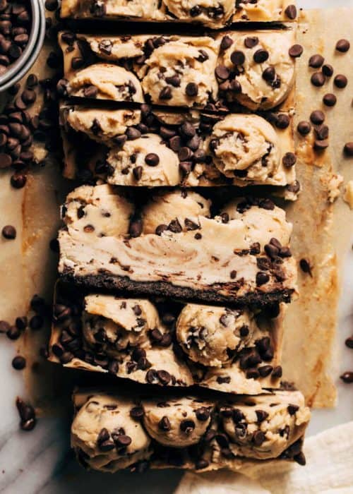 the side of a slice of cookie dough cheesecake