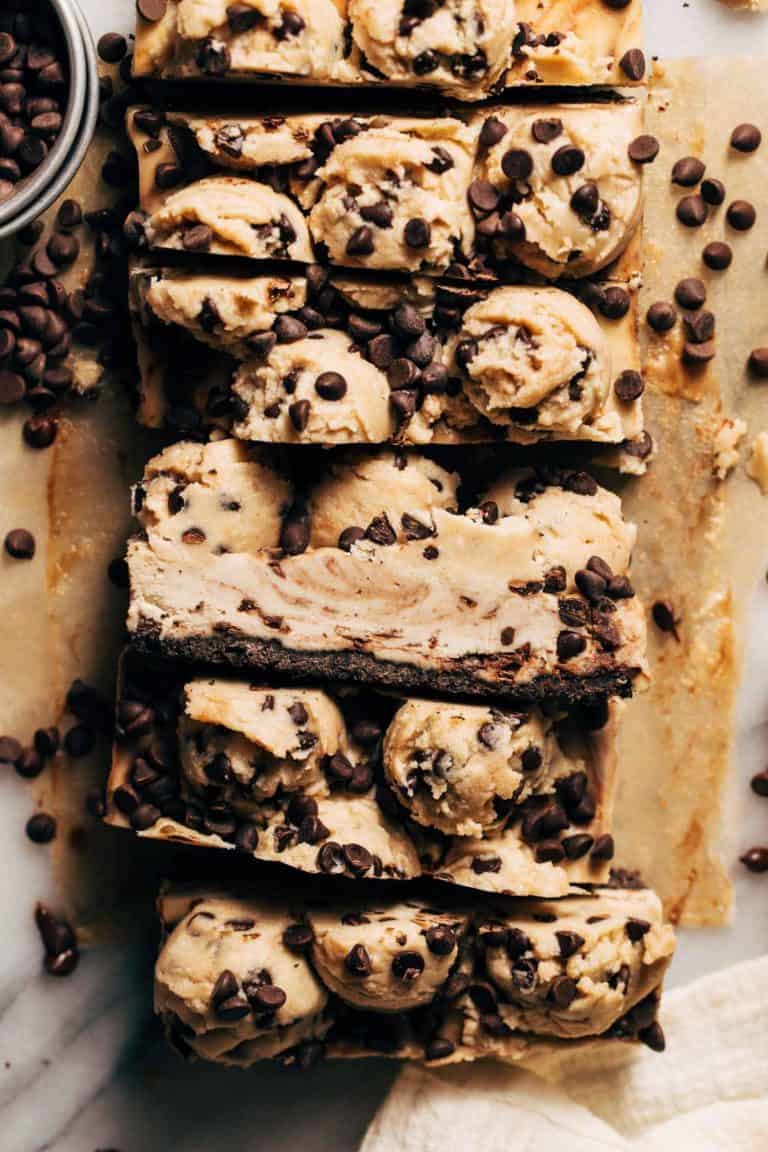 the side of a slice of cookie dough cheesecake