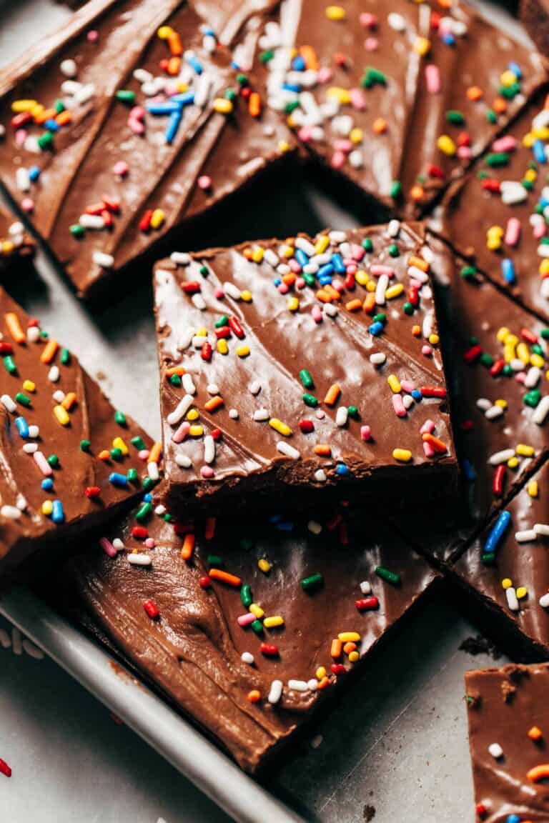 close up a slice of a lunch lady brownie with glossy frosting on top