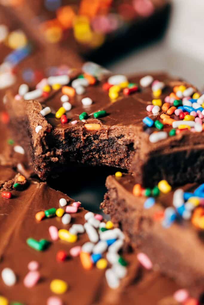 close up on a bite taken from a fudgy lunch lady brownie