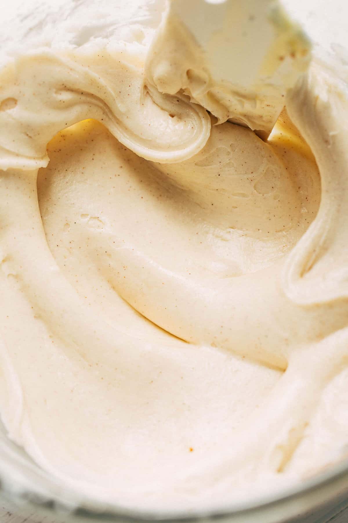 a bowl of cream cheese frosting