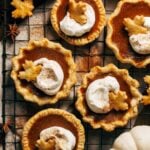 mini pumpkin pies on a cooling rack