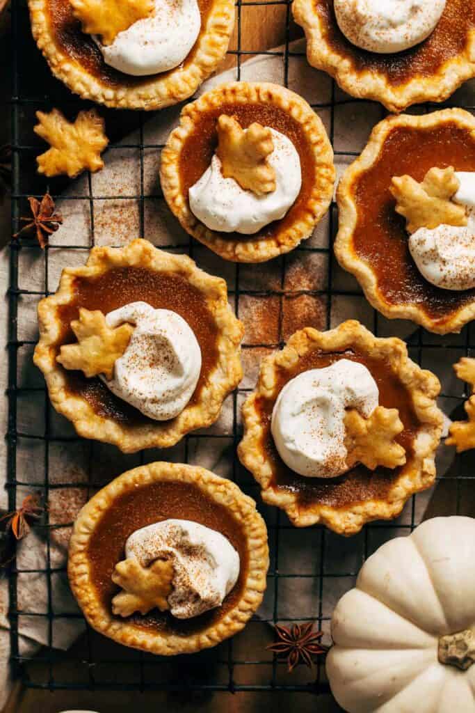 mini pumpkin pies on a cooling rack