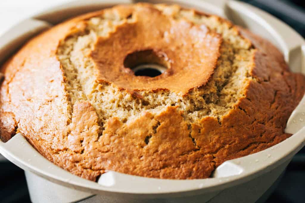 a freshly baked banana bundt cake still in the pan