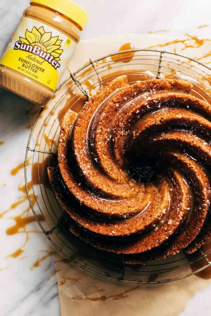 the top of a banana bundt cake drizzled in toffee sauce