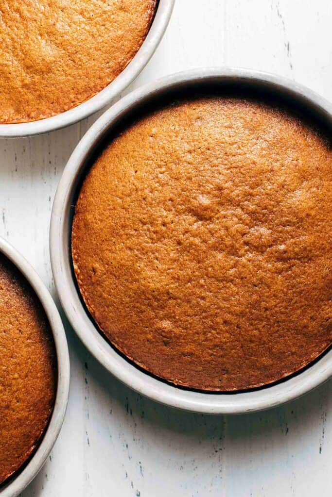 gingerbread cake layers in their baking pans