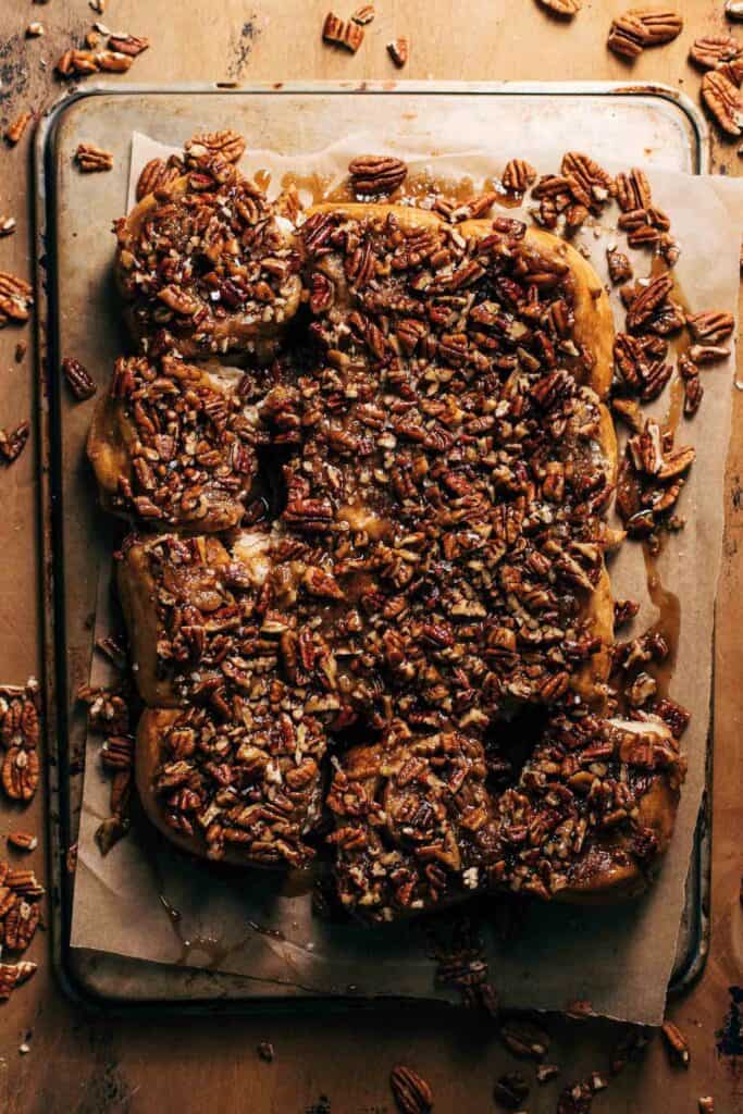 maple pecan sticky buns on a sheet pan