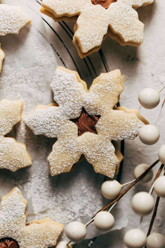 a snowflake cookie filled with milk chocolate