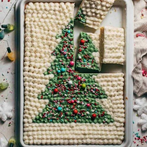 sugar cookie bars decorated with a frosted Christmas tree