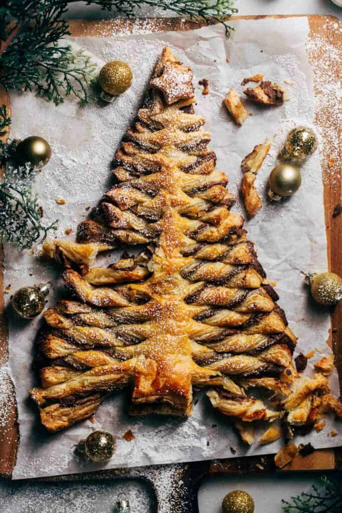 a puff pastry christmas tree on a serving board