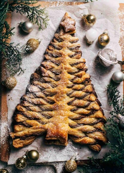 a puff pastry christmas tree on a serving board