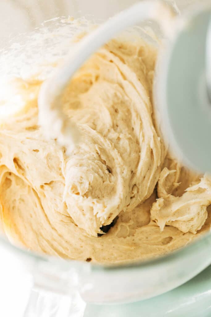 gluten free cinnamon roll dough in a mixing bowl