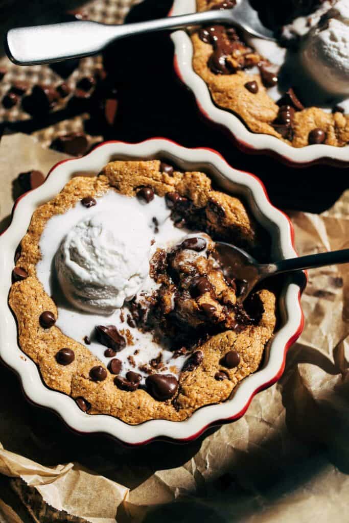 scooping into a mini deep dish cookie