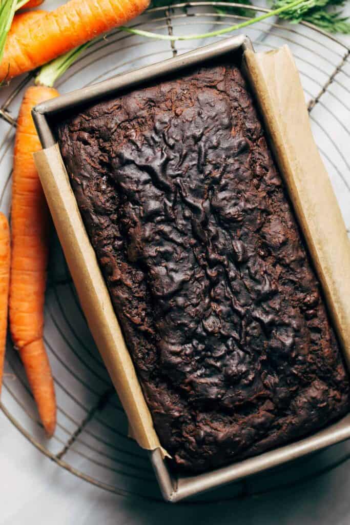 a chocolate carrot cake freshly baked in a loaf pan