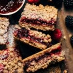 berry crumble bars on their side