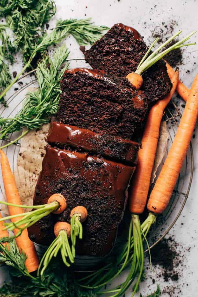 the top of a sliced chocolate carrot cake on a wire rack