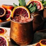 blood orange mexican mule in a copper mug