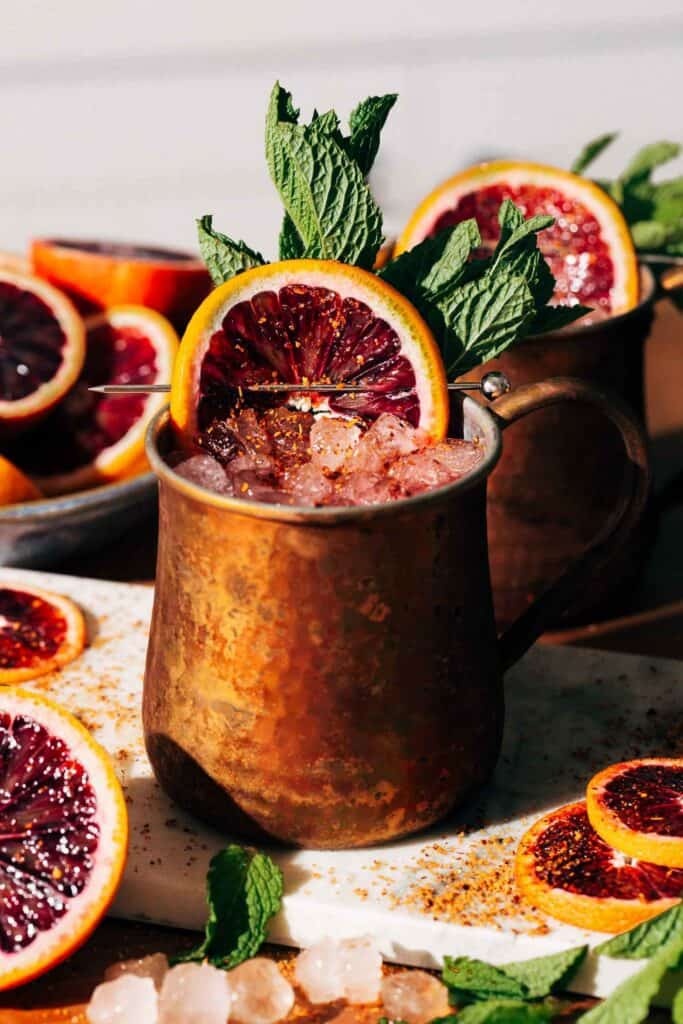 blood orange mexican mule in a copper mug