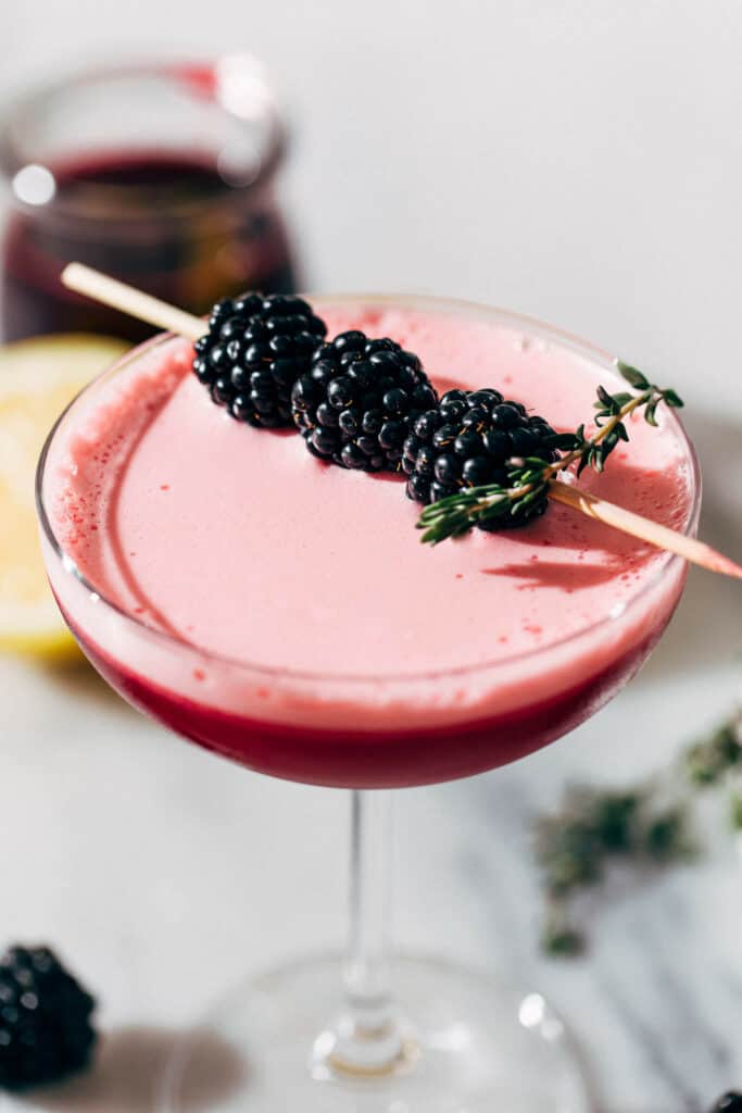 close up on the top of a blackberry vodka sour