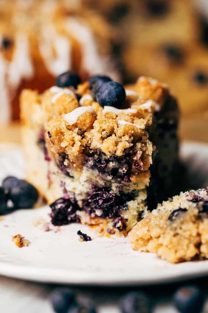 close up on a slice of blueberry sour cream coffee cake