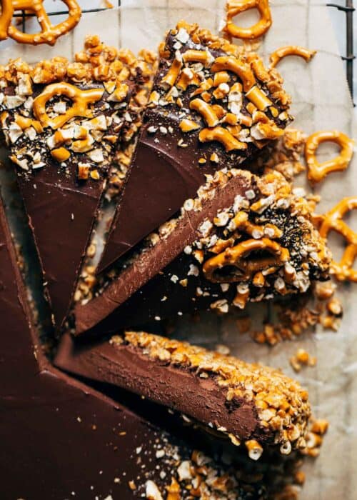 close up on slices of chocolate tart with a pretzel crust