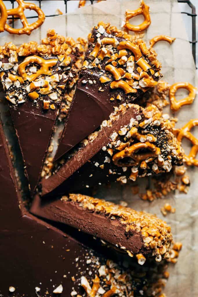 close up on slices of chocolate tart with a pretzel crust
