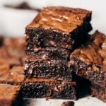 a stack of fudgy gluten free brownies