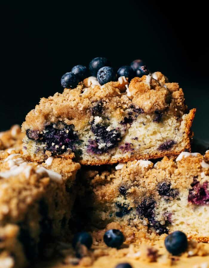 slices of blueberry coffee cake stacked on top of each other