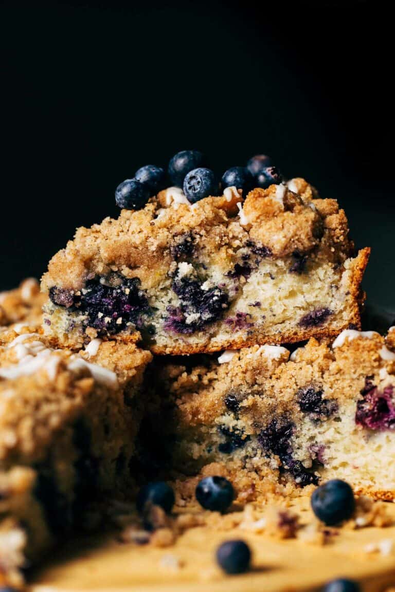 slices of blueberry coffee cake stacked on top of each other