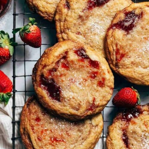 strawberry jam cookies on a cooling rack
