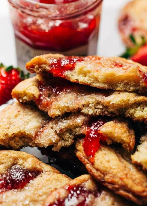 a stack of sugar cookies swirled with strawberry jam