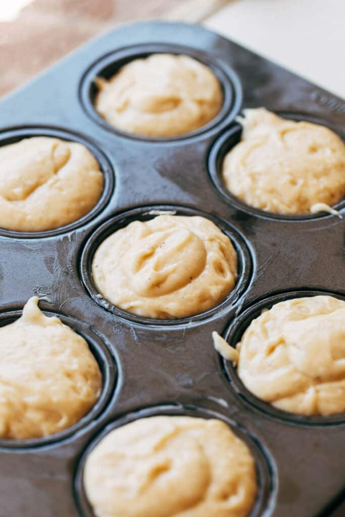muffin batter in a muffin pan